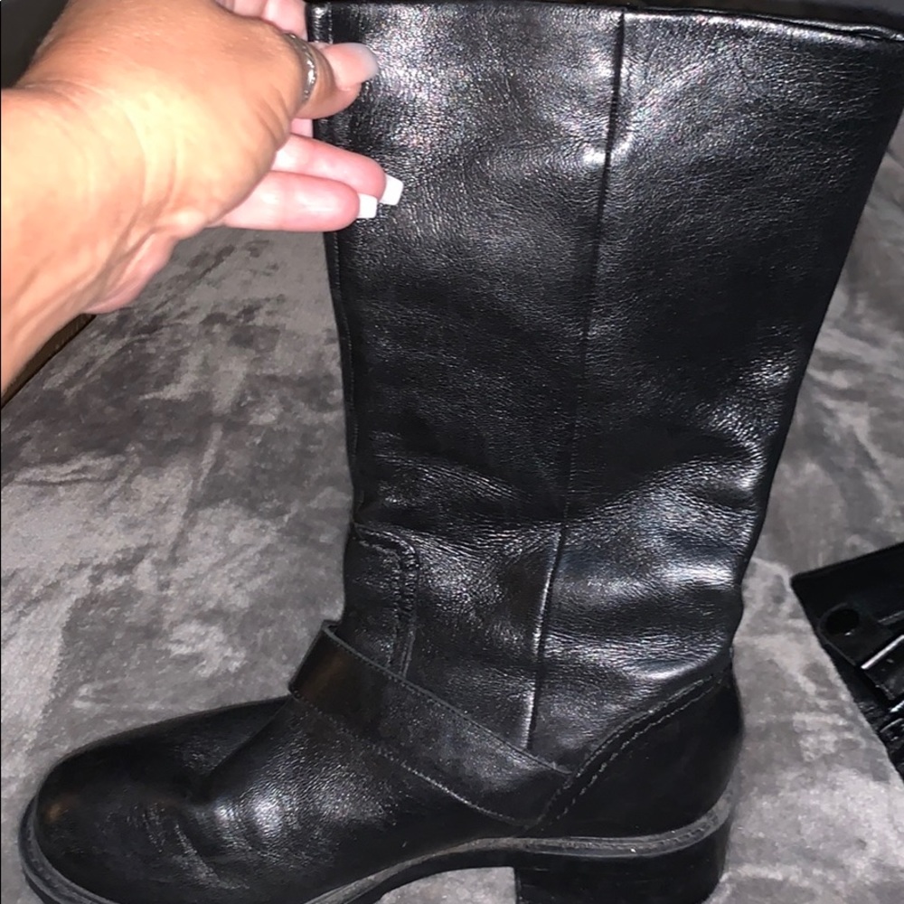 Black mid calf boots by Steve Madden